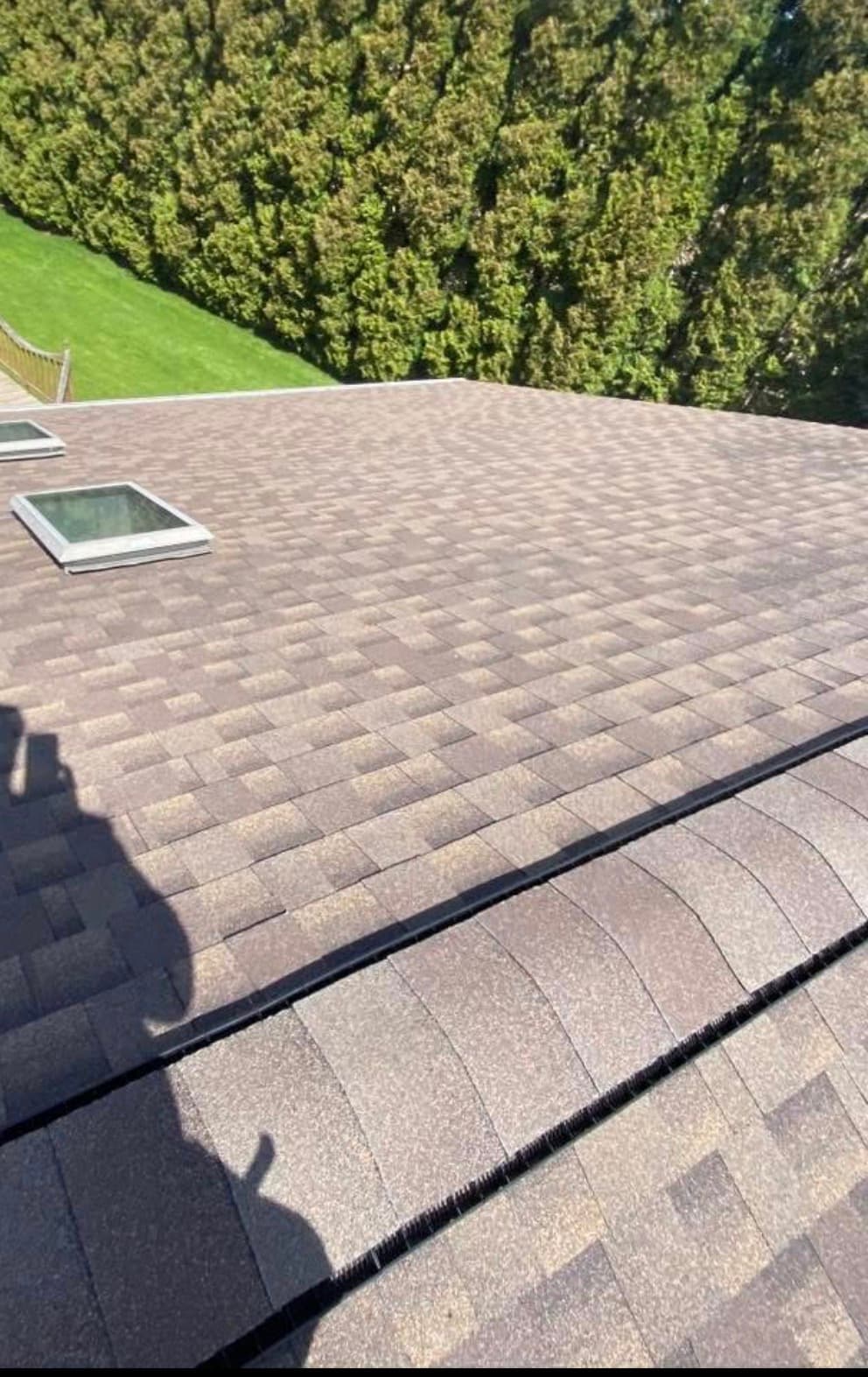 New architectural shingles with clean skylight flashing, West Michigan