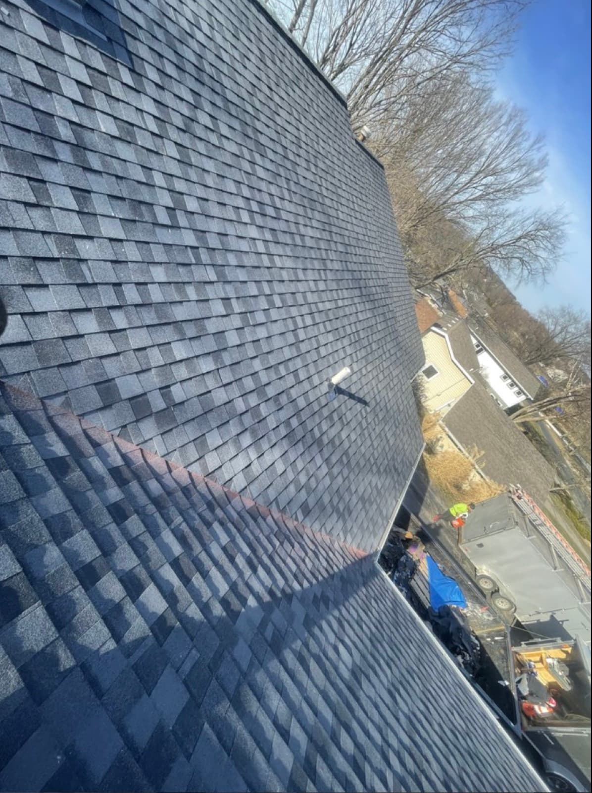 Same roof after: finished dark architectural shingles